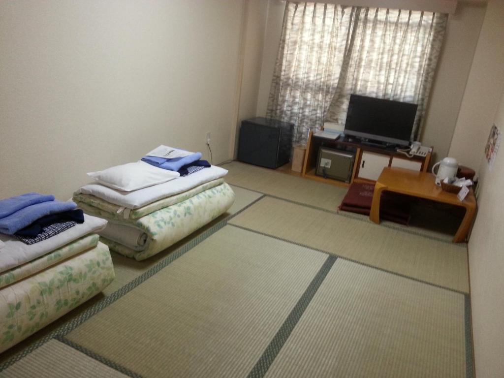 Hotel Hashimoto Sapporo Quarto foto